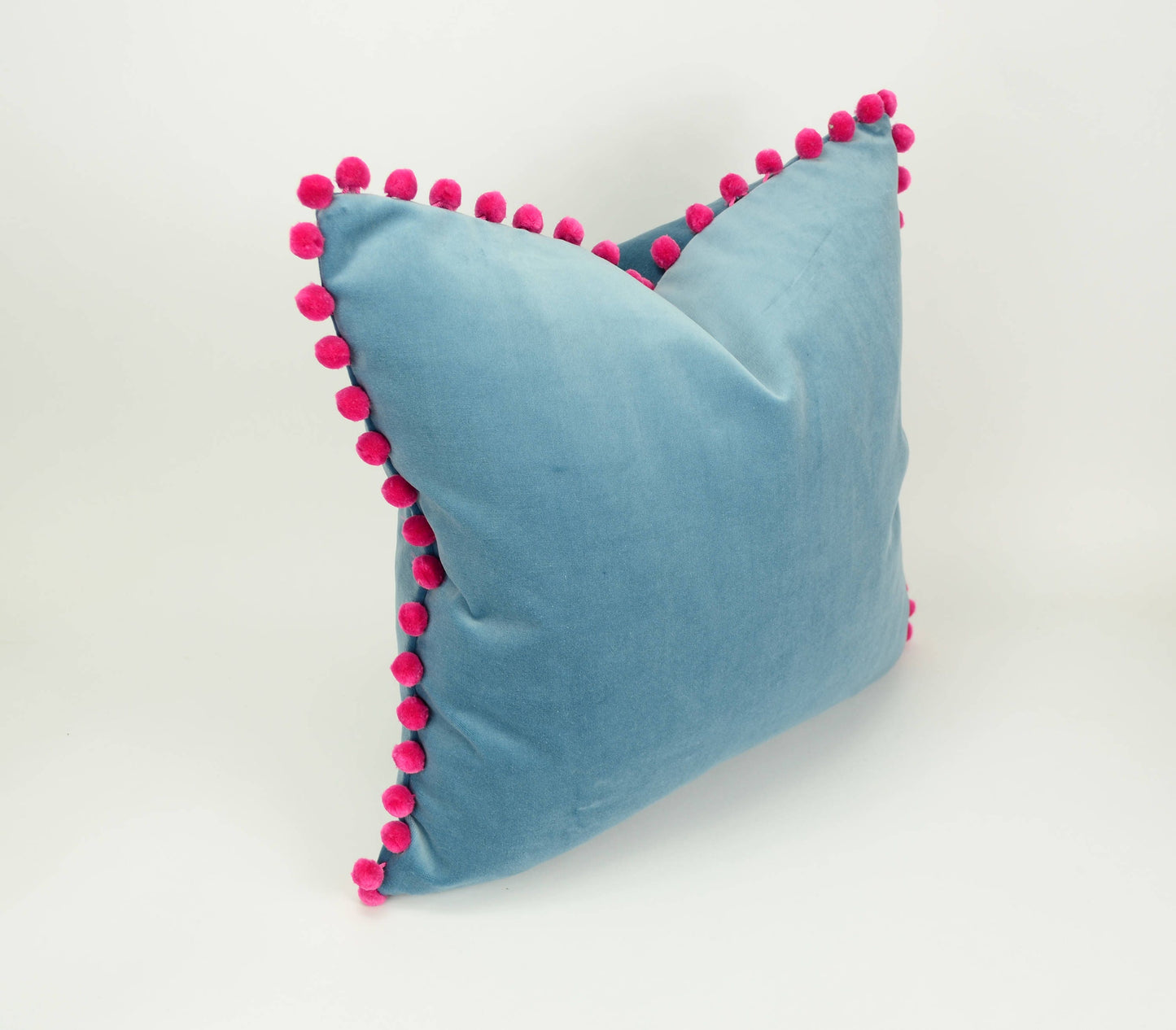 Blue velvet pom pom pillow // pink pom pom cushion // blue velvet with pink pom poms pillow