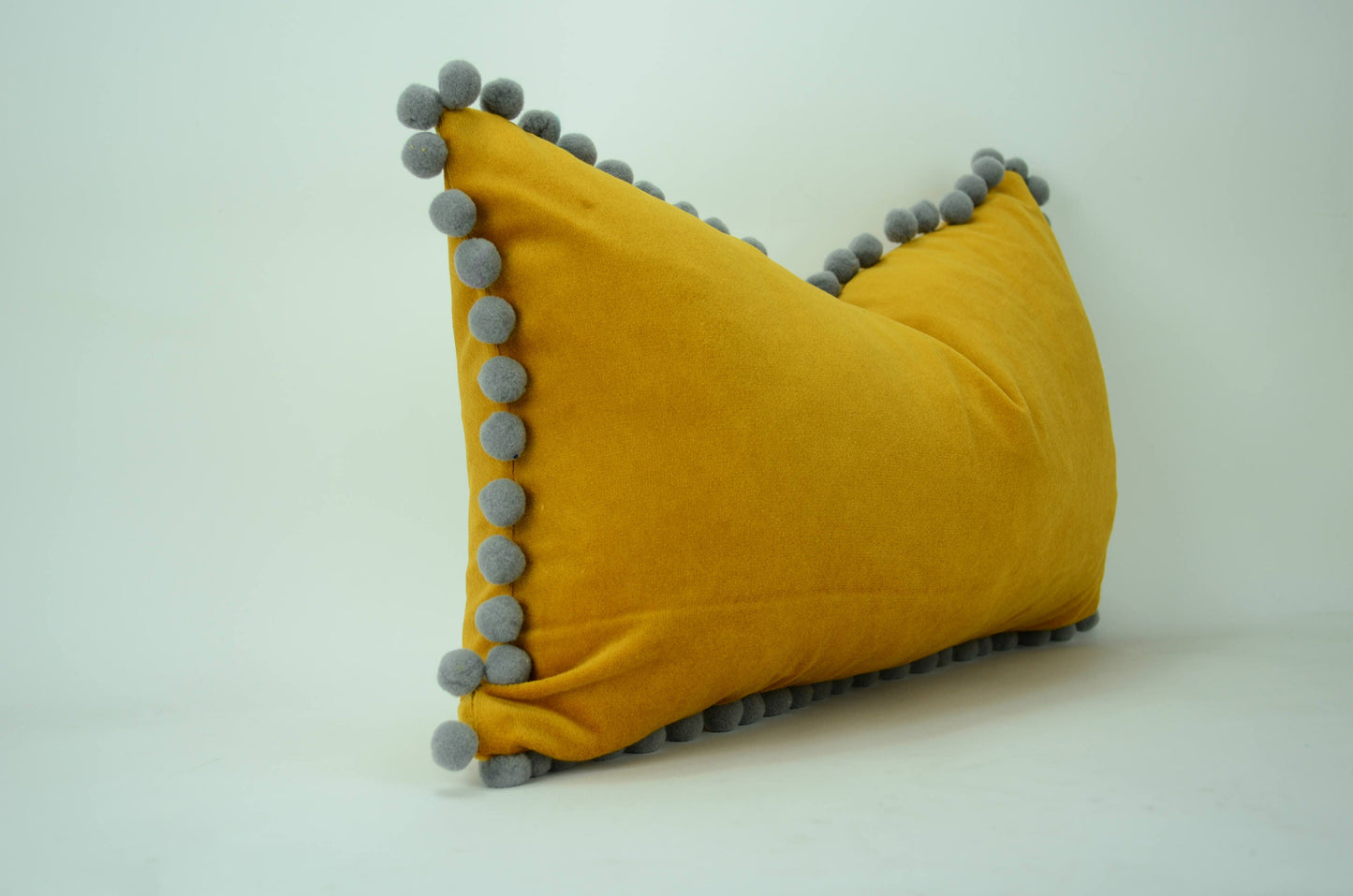 Pom pom pillow // mustard yellow velvet cushion // grey and yellow // yellow pom pom pillow