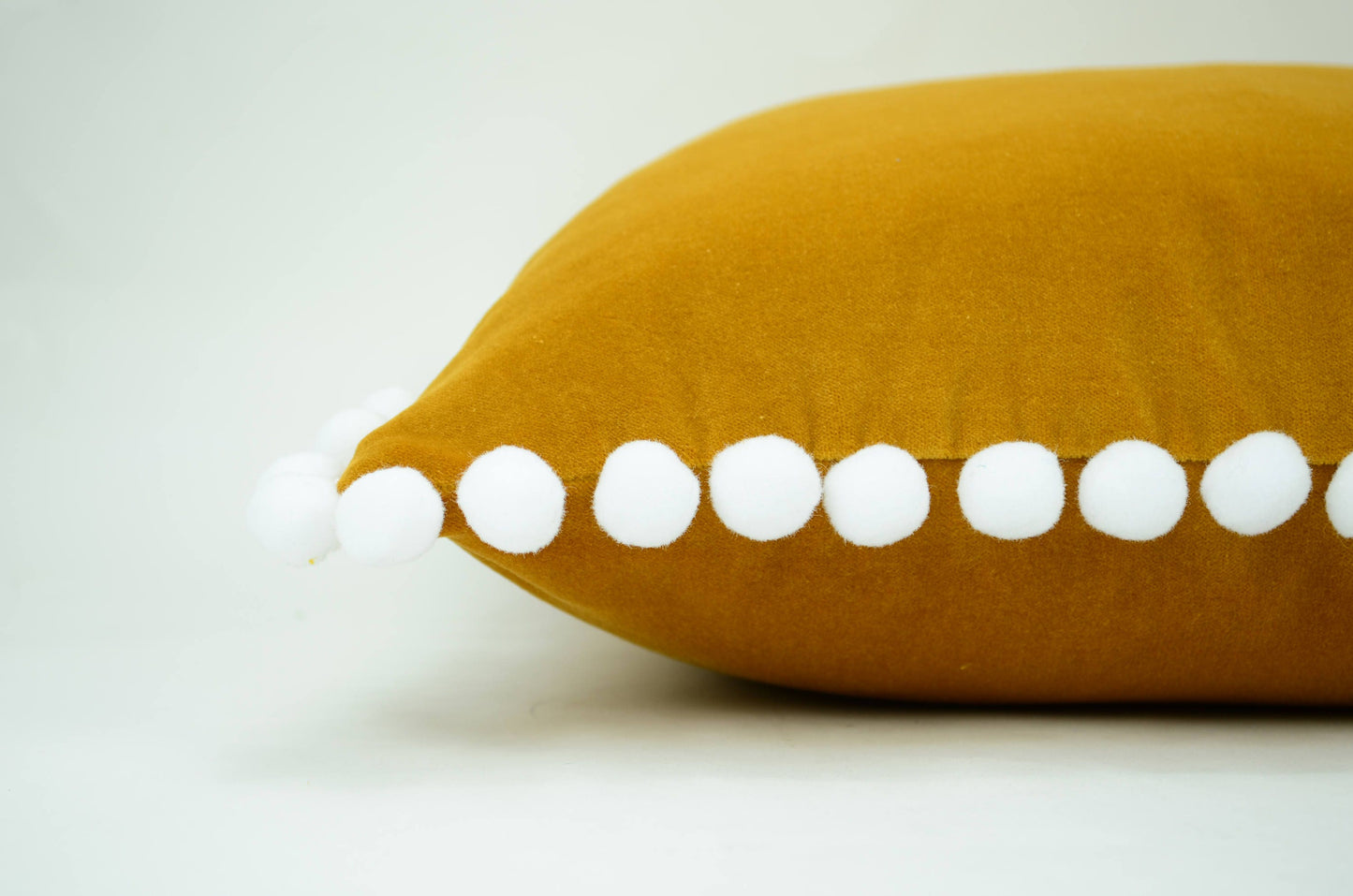 Mustard pillow with pom poms // pom pom cushion // pom pom pillow // mustard velvet pom pillow