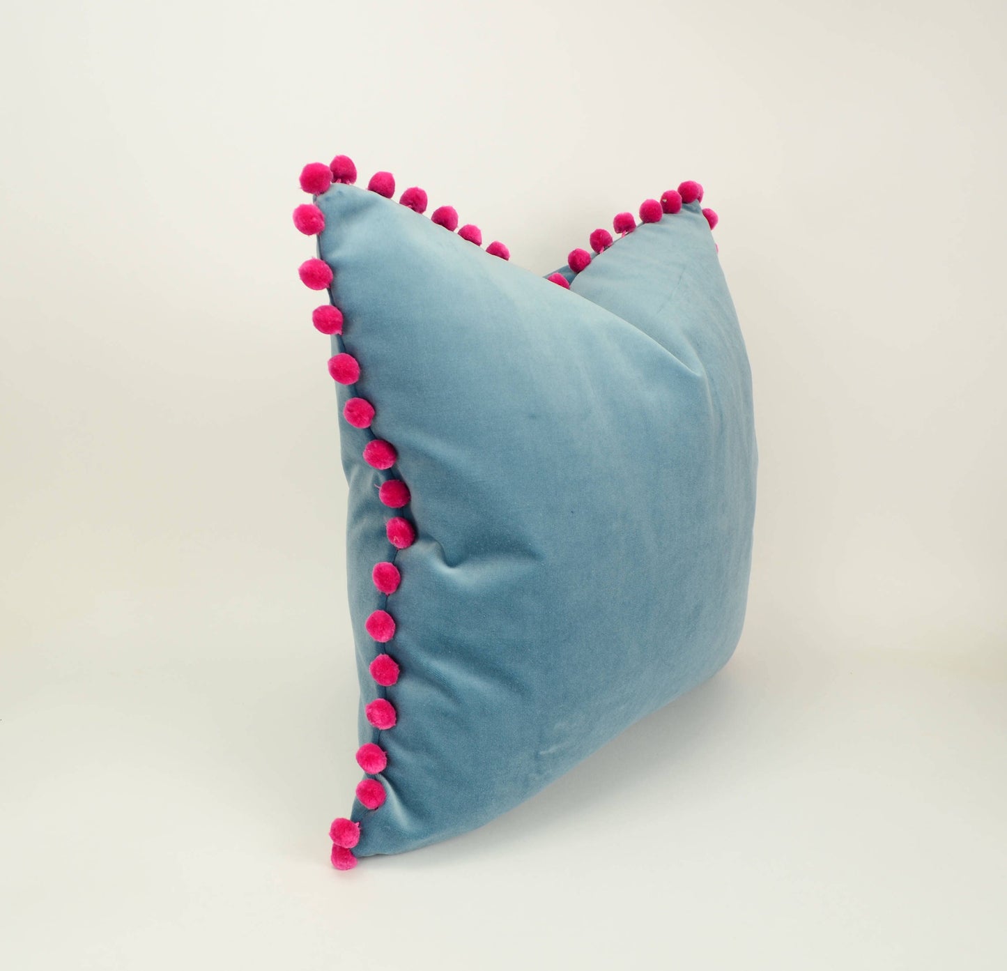 Blue velvet pom pom pillow // pink pom pom cushion // blue velvet with pink pom poms pillow