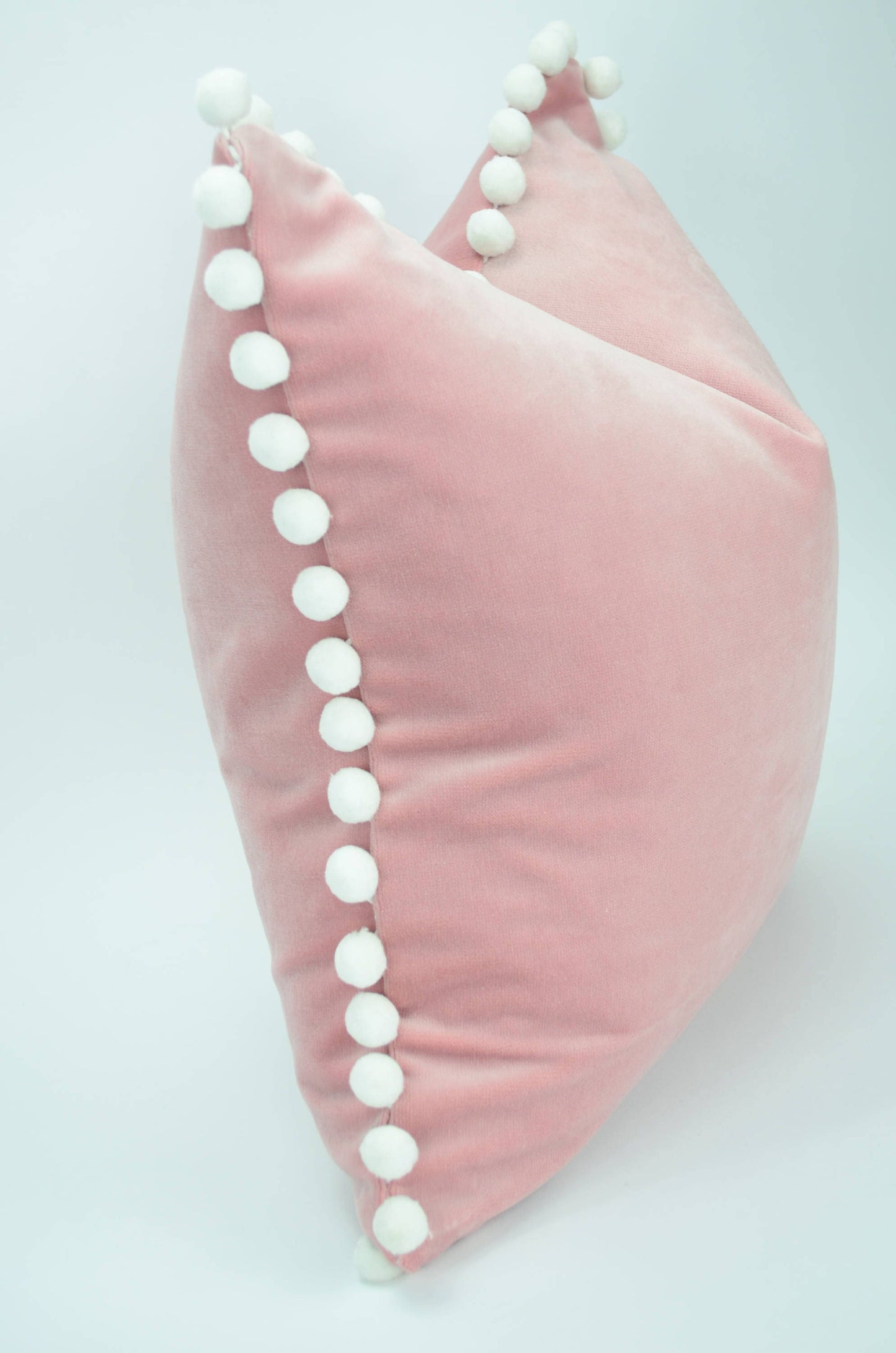 Blush velvet with white pom poms // blush with white pom poms // pink pillow with white pom poms // pink and white // white pom poms