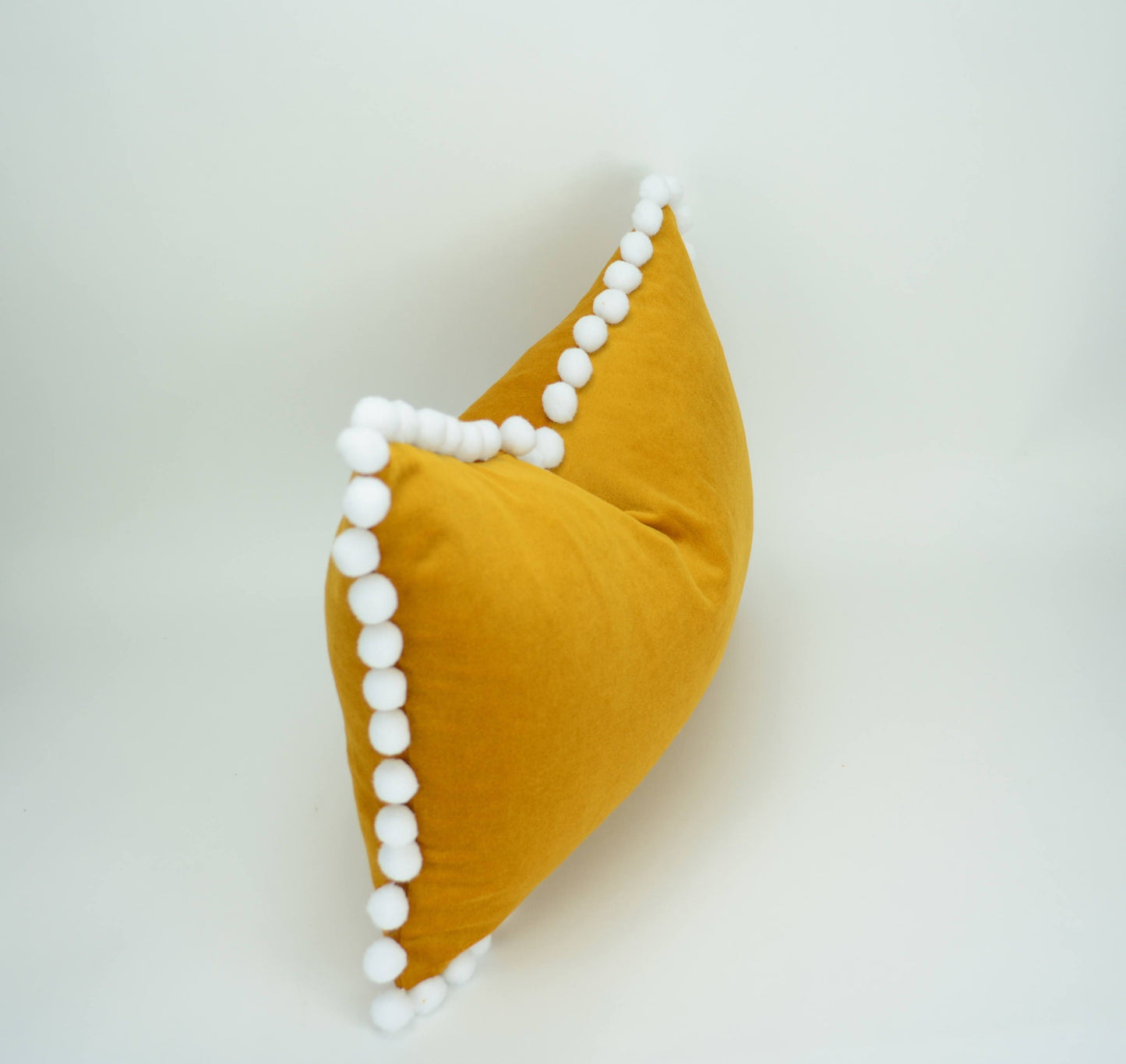 Mustard pillow with pom poms // yellow pom pom cushion // pom pom pillow // mustard velvet pom pillow