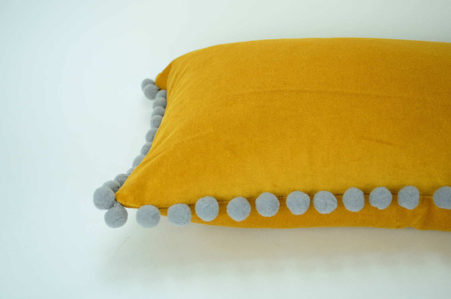 Pom pom pillow  // mustard yellow velvet cushion // grey and yellow  // yellow pom pom pillow