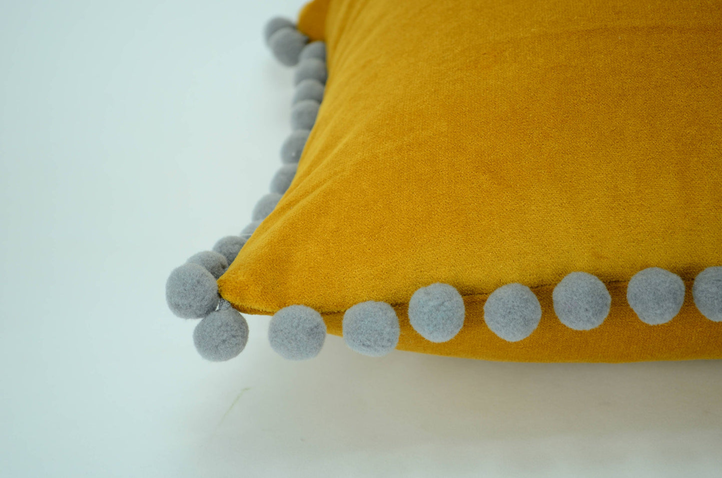 Pom pom pillow  // mustard yellow velvet cushion // grey and yellow  // yellow pom pom pillow