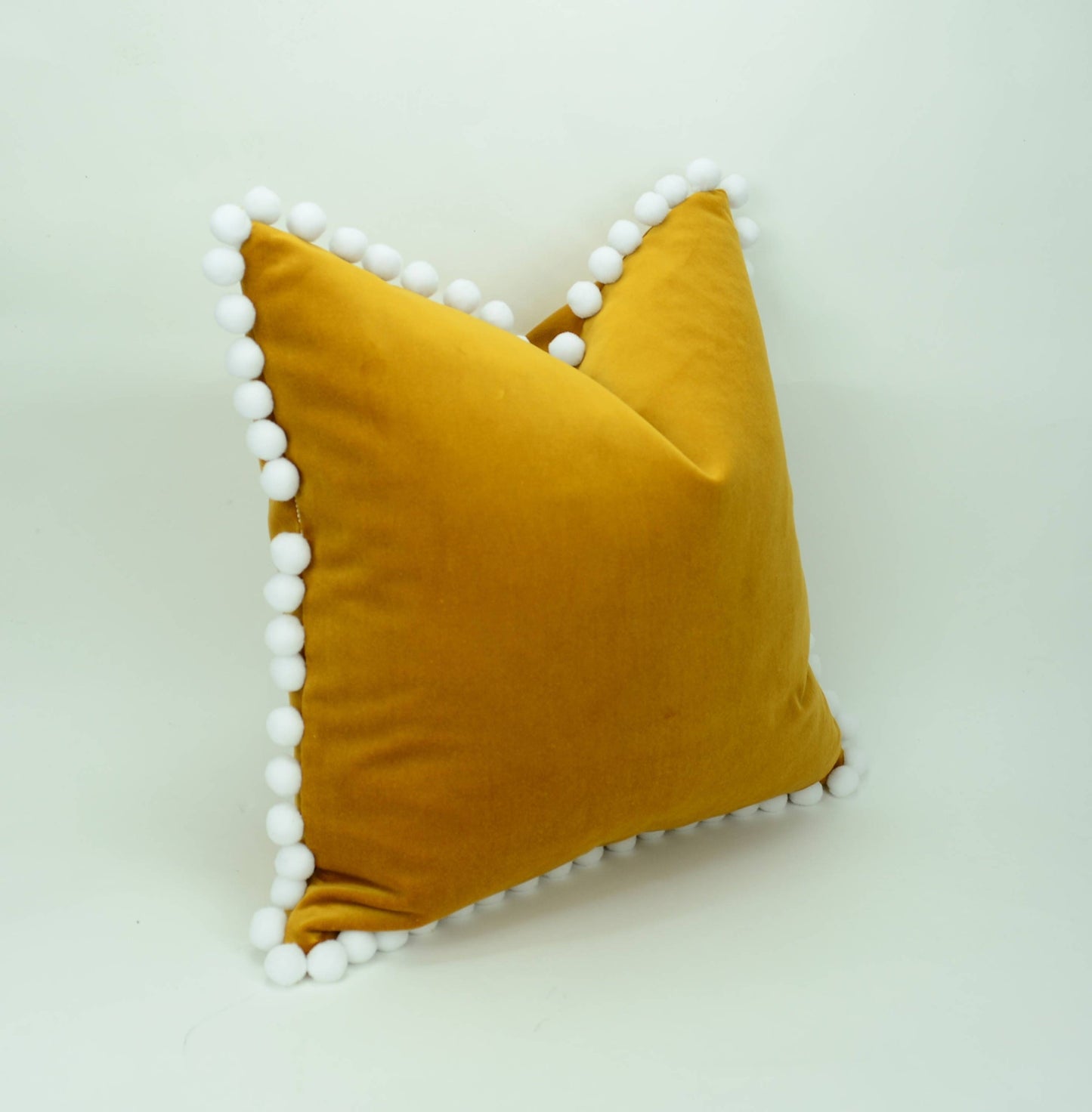 Mustard pillow with pom poms // pom pom cushion // pom pom pillow // mustard velvet pom pillow