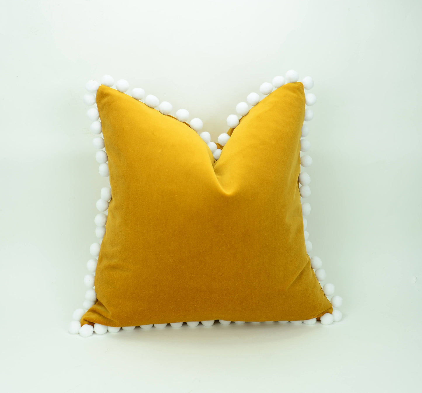 Mustard pillow with pom poms // pom pom cushion // pom pom pillow // mustard velvet pom pillow