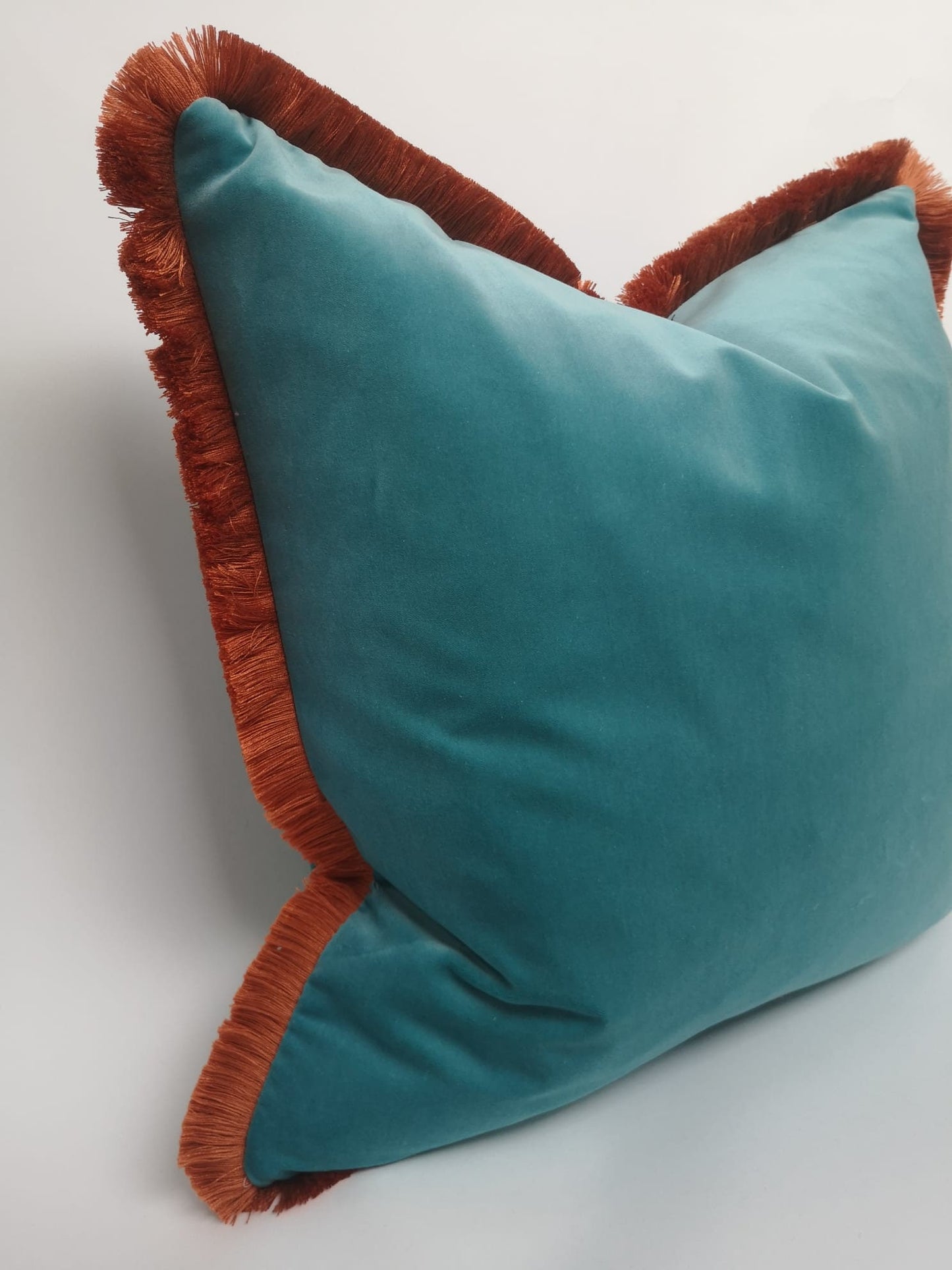Aqua and coral fringe pillow, aqua with orange fringe pillow, aqua and coral pillow